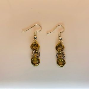 Silver and golden dangling earrings